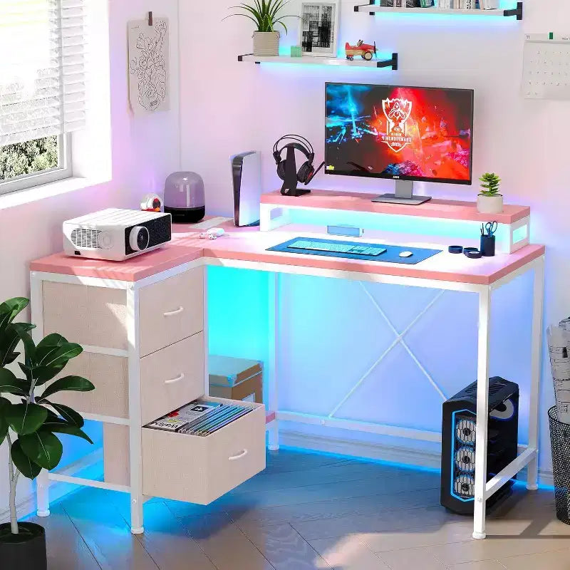 Scrivania Gaming a L con Luci LED, Prese di Corrente, Cassetti e Ripiani, Scrivania ad Angolo per Ufficio Domestico, Nero